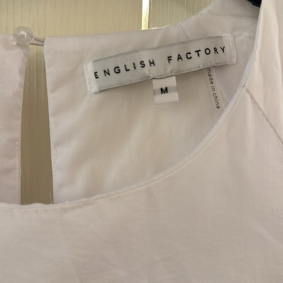 White English Factory mini dress with puff sleeves and pockets. - Picture 3 of 3